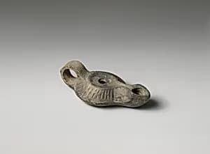 Terracotta oil lamp by Unknown Artist