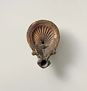 Terracotta oil lamp by Unknown Artist