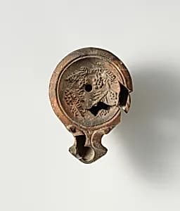Terracotta oil lamp by Unknown Artist
