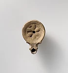 Terracotta oil lamp by Unknown Artist
