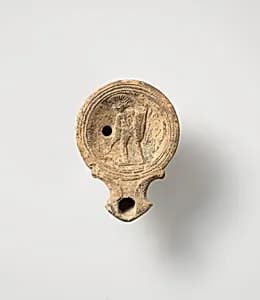 Terracotta oil lamp by Unknown Artist