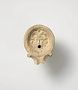 Terracotta oil lamp by Unknown Artist