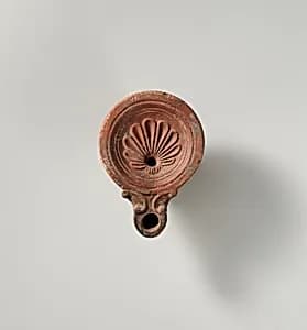 Terracotta oil lamp by Unknown Artist
