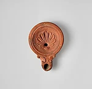 Terracotta oil lamp by Unknown Artist