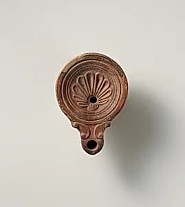 Terracotta oil lamp by Unknown Artist
