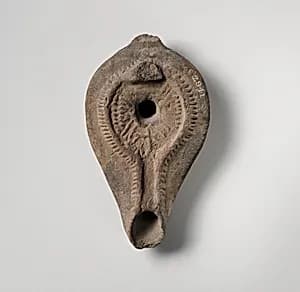 Terracotta oil lamp by Unknown Artist