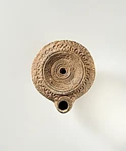 Terracotta oil lamp by Unknown Artist