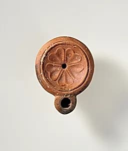 Terracotta oil lamp by Unknown Artist