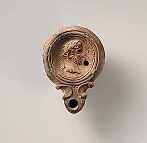 Terracotta oil lamp by Unknown Artist