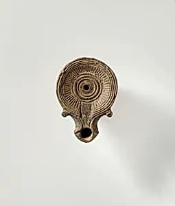 Terracotta oil lamp by Unknown Artist