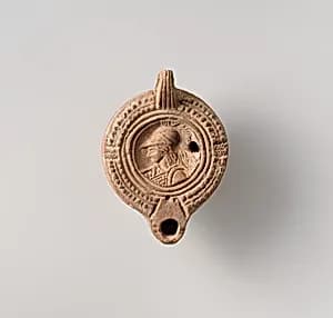 Terracotta oil lamp by Unknown Artist