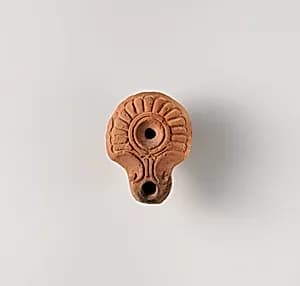 Terracotta oil lamp by Unknown Artist