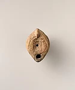 Terracotta oil lamp by Unknown Artist