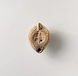 Terracotta oil lamp by Unknown Artist