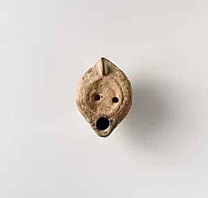 Terracotta oil lamp by Unknown Artist