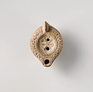 Terracotta oil lamp by Unknown Artist