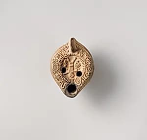 Terracotta oil lamp by Unknown Artist