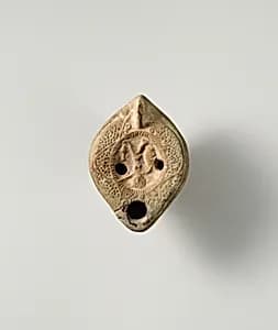 Terracotta oil lamp by Unknown Artist