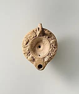 Terracotta oil lamp by Unknown Artist