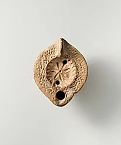 Terracotta oil lamp by Unknown Artist