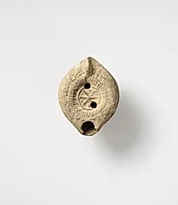 Terracotta oil lamp by Unknown Artist