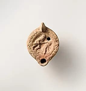 Terracotta oil lamp by Unknown Artist