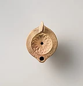 Terracotta oil lamp by Unknown Artist