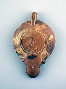 Terracotta oil lamp by Unknown Artist