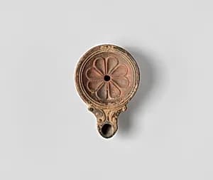 Terracotta oil lamp by Unknown Artist
