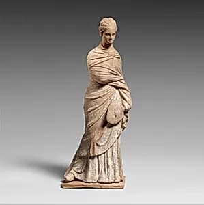 Terracotta statuette of a draped woman by Unknown Artist