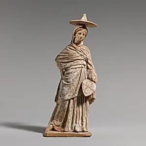 Terracotta statuette of a woman by Unknown Artist
