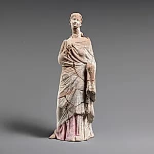 Terracotta statuette of a woman by Unknown Artist