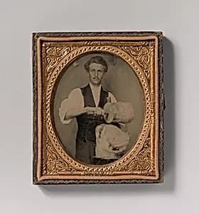 [Man Riving Wood with Froe and Club] by Unknown