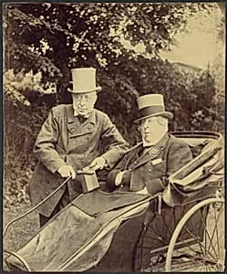 [Two Gentlemen, One in Cart] by Unknown