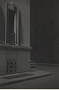 Car behind building