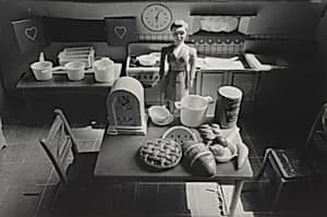 Woman/Purple Dress/Kitchen