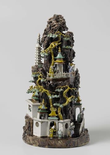 Figure of a rock with pavillions, figures and trees by anonymous
