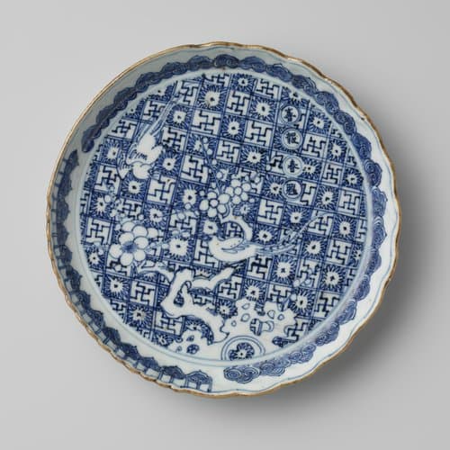 Saucer-dish with two pheasants on a prunus tree on a ground of flowers and swastikas by anonymous; anonymous