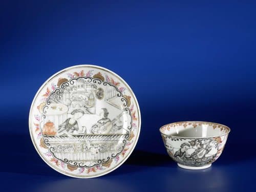 Bell-shaped cup and saucer with a woman and a man with a mandolin by anonymous
