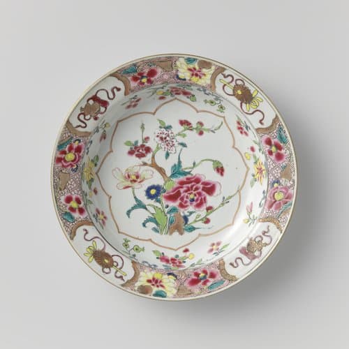 Soup plate with flowering plants, flower sprays and attributes of the Eight Immortals by anonymous