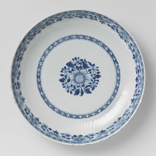 Saucer-dish with flower sprays and incised flower petals by anonymous