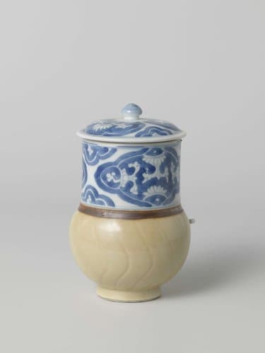 Tankard with light brown and panels with flower scrolls by anonymous