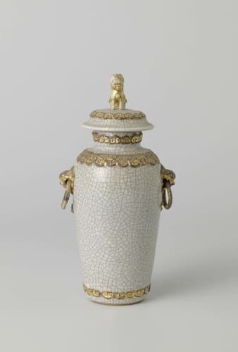 Covered jar with monster heads and gilded bands with ruyi motif by anonymous
