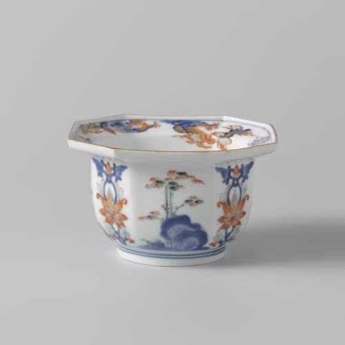 Octagonal bowl with flowering plants near a rock and floral scrolls by anonymous