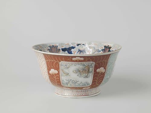 Bowl with floral scrolls, prunus trees and dragons in panels and diaper patterns by anonymous