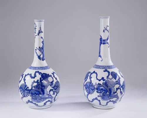 Bottle vase with three shishi and a dragon by anonymous