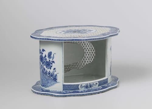 Oval stove with pierced sides and FitzHugh border by anonymous