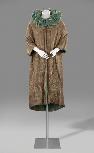 Evening coat with ruffled collar by anonymous