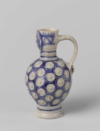 Jug with a mask and medallions by anonymous