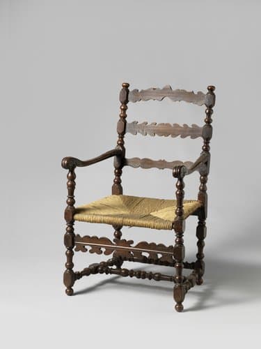 Armstoel van kerse- of pruimenhout by anonymous